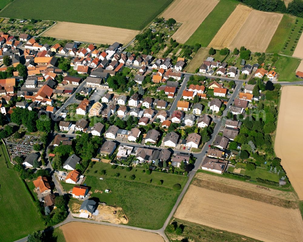 Aerial photograph Wersau - Agricultural land and field boundaries surround the settlement area of the village in Wersau in the state Hesse, Germany