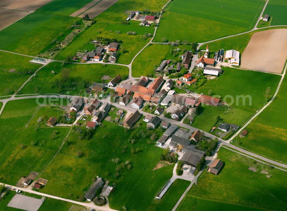 Aerial image Wettingen - Agricultural land and field boundaries surround the settlement area of the village in Wettingen in the state Baden-Wuerttemberg, Germany