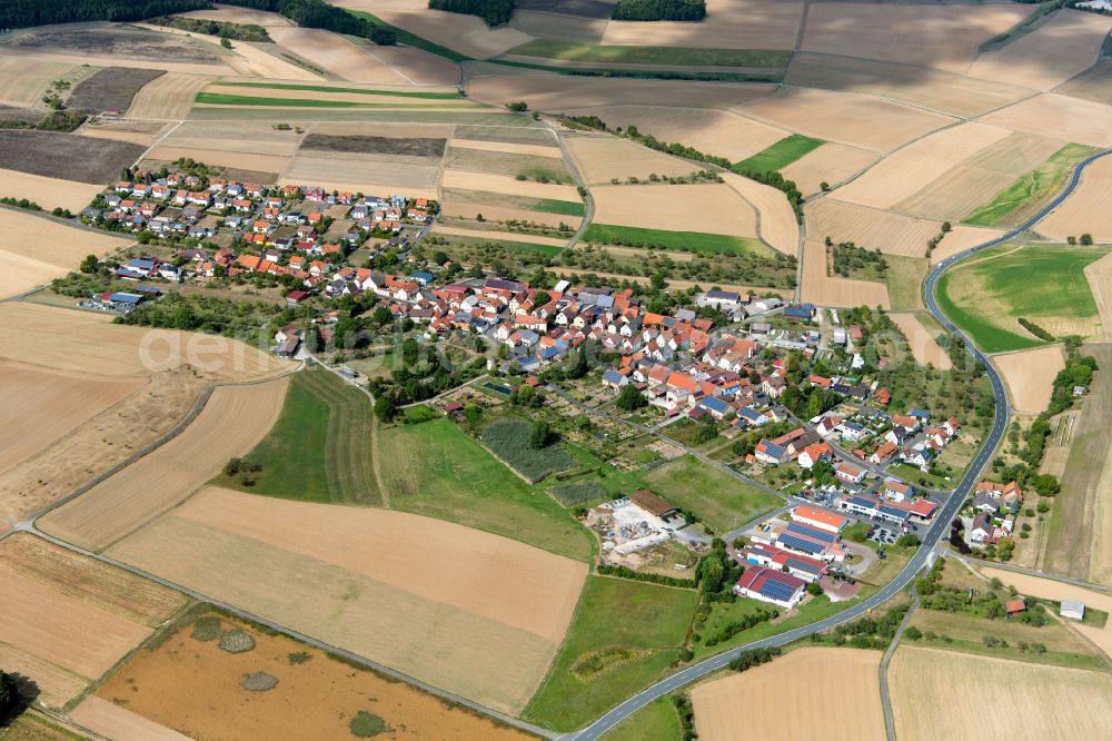 Aerial image Weyersfeld - Agricultural land and field boundaries surround the settlement area of the village in Weyersfeld in the state Bavaria, Germany