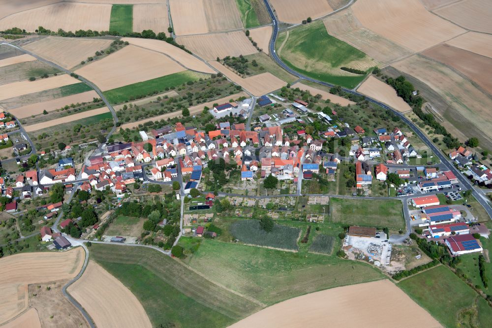 Aerial image Weyersfeld - Agricultural land and field boundaries surround the settlement area of the village in Weyersfeld in the state Bavaria, Germany