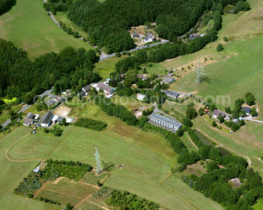 Wiebelsaat from above - Agricultural land and field boundaries surround the settlement area of the village in Wiebelsaat in the state North Rhine-Westphalia, Germany