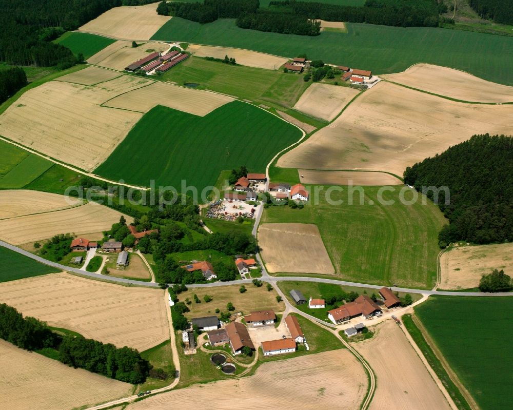 Wiedersbach from the bird's eye view: Agricultural land and field boundaries surround the settlement area of the village in Wiedersbach in the state Bavaria, Germany