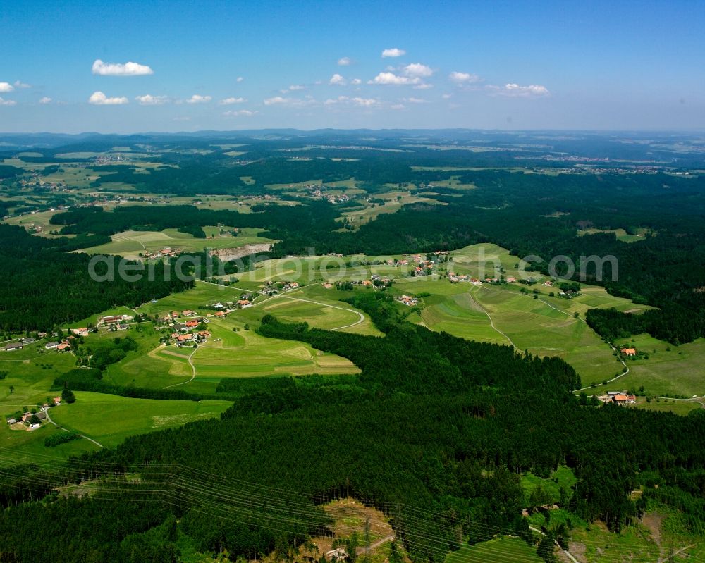 Wieladingen from above - Agricultural land and field boundaries surround the settlement area of the village in Wieladingen in the state Baden-Wuerttemberg, Germany