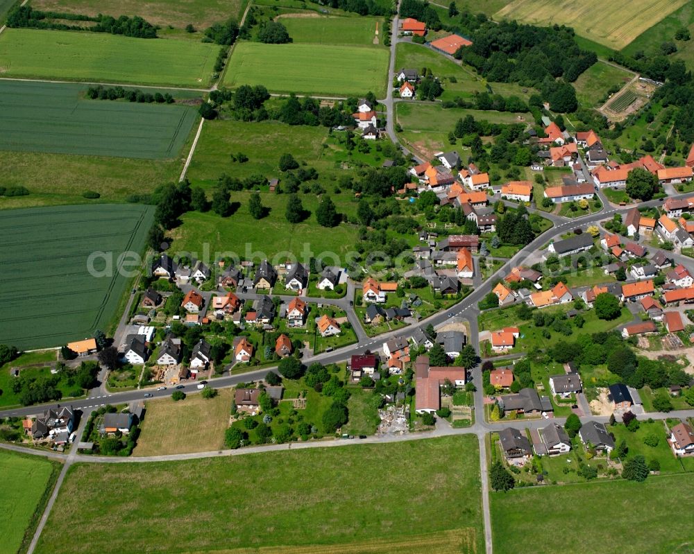 Aerial image Wiershausen - Agricultural land and field boundaries surround the settlement area of the village in Wiershausen in the state Lower Saxony, Germany