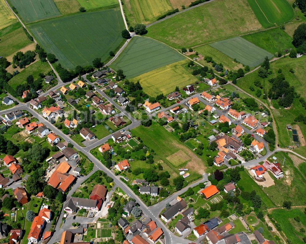 Aerial photograph Wiershausen - Agricultural land and field boundaries surround the settlement area of the village in Wiershausen in the state Lower Saxony, Germany