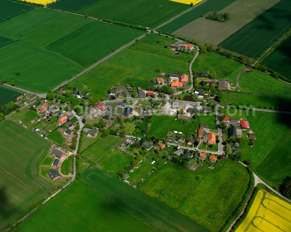 Aerial photograph Wiershop - Agricultural land and field boundaries surround the settlement area of the village in Wiershop in the state Schleswig-Holstein, Germany