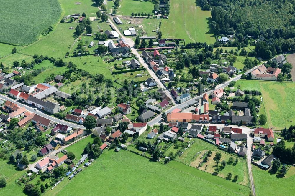 Aerial photograph Wiesenburg/Mark - Agricultural land and field boundaries surround the settlement area of the village in Wiesenburg/Mark in the state Brandenburg, Germany