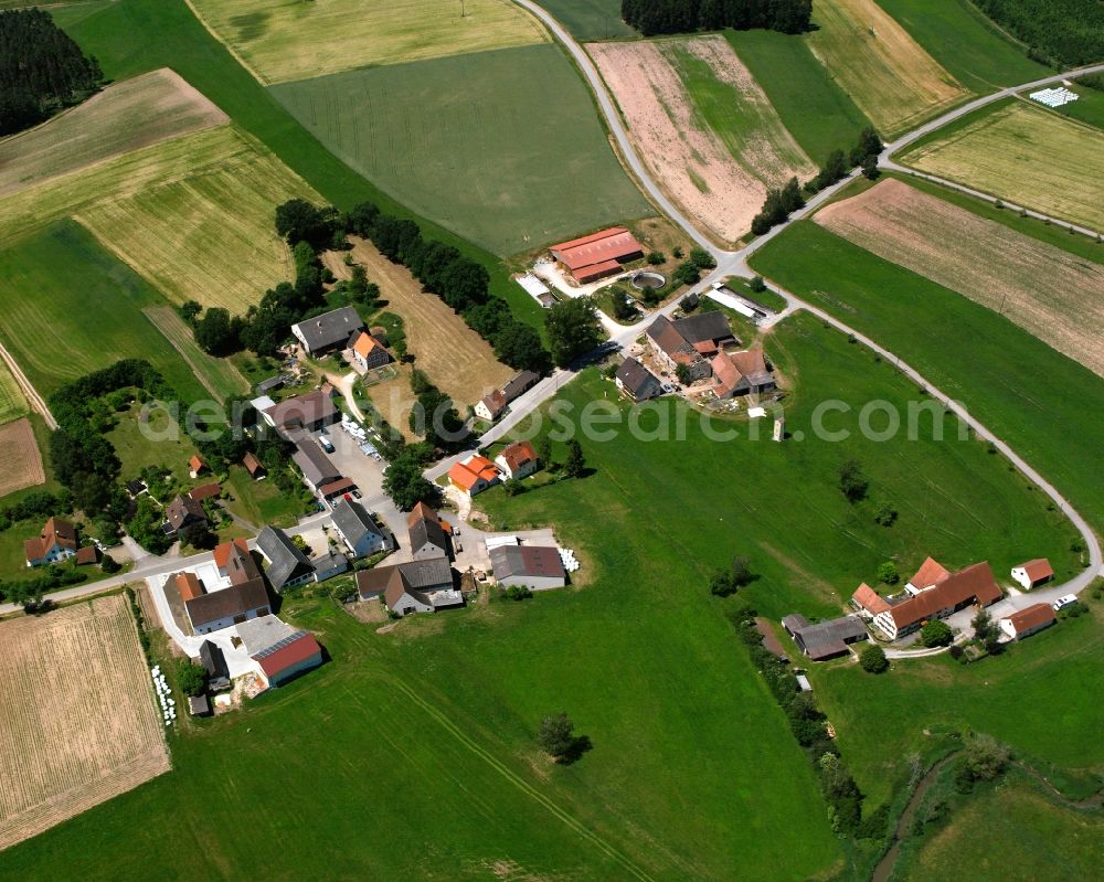 Wieseth from the bird's eye view: Agricultural land and field boundaries surround the settlement area of the village in Wieseth in the state Bavaria, Germany