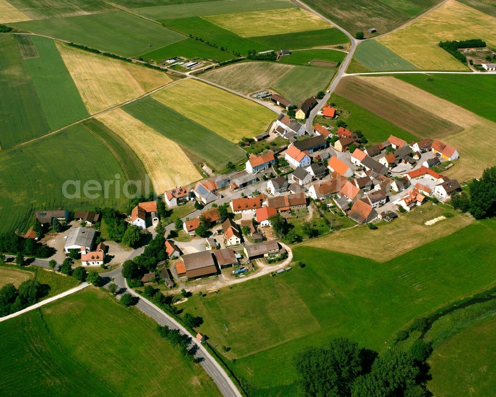 Aerial image Wiesethbruck - Agricultural land and field boundaries surround the settlement area of the village in Wiesethbruck in the state Bavaria, Germany