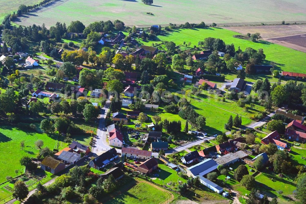 Aerial photograph Wilmersdorf - Agricultural land and field boundaries surround the settlement area of the village in Wilmersdorf in the state Brandenburg, Germany