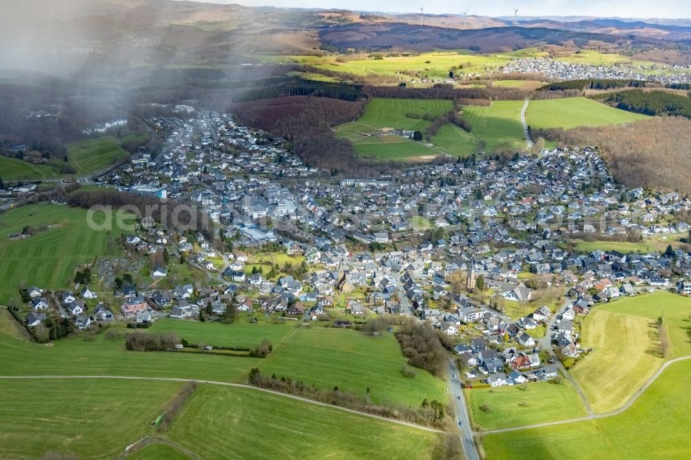 Wilnsdorf from above - Agricultural land and field boundaries surround the settlement area of the village in Wilnsdorf in the state North Rhine-Westphalia, Germany