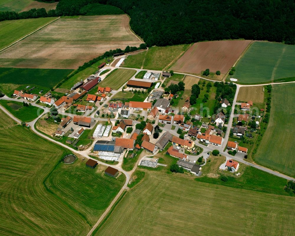 Aerial image Winkel - Agricultural land and field boundaries surround the settlement area of the village in Winkel in the state Bavaria, Germany