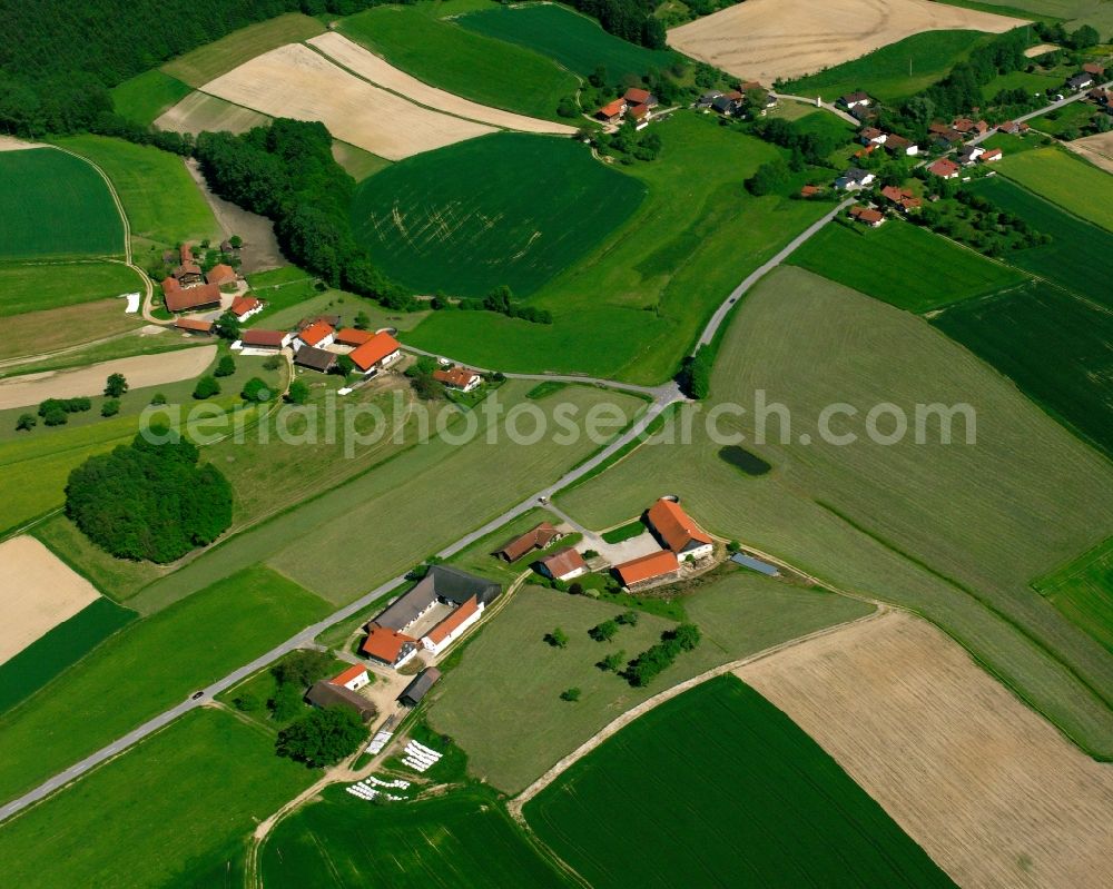 Winkl from the bird's eye view: Agricultural land and field boundaries surround the settlement area of the village in Winkl in the state Bavaria, Germany