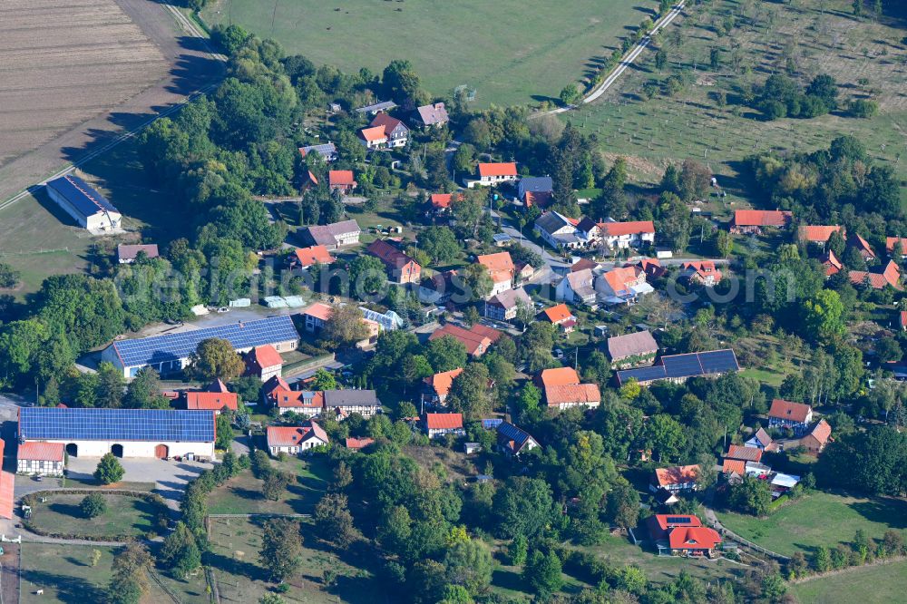 Aerial photograph Wülperode - Agricultural land and field boundaries surround the settlement area of the village in Wuelperode in the state Saxony-Anhalt, Germany