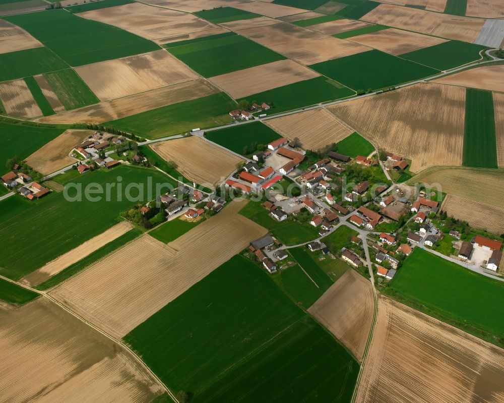 Aerial image Wolferkofen - Agricultural land and field boundaries surround the settlement area of the village in Wolferkofen in the state Bavaria, Germany