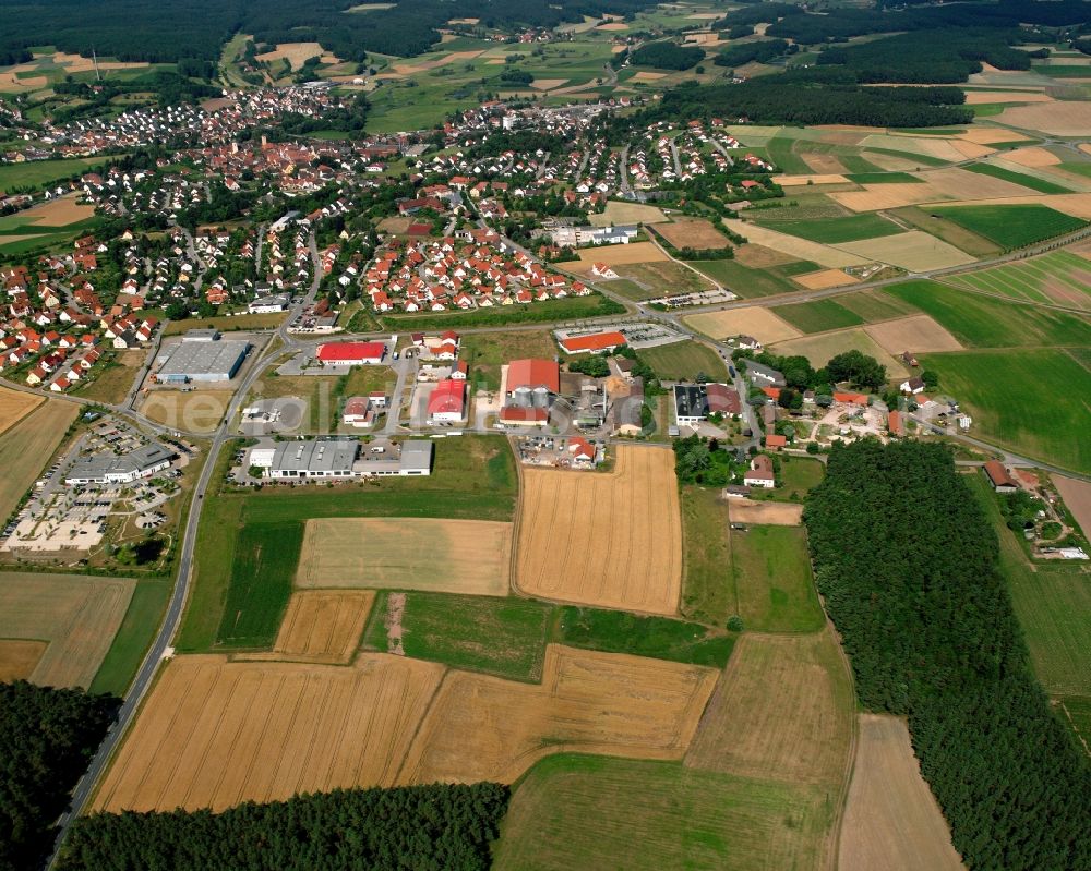 Aerial image Wolfsau - Agricultural land and field boundaries surround the settlement area of the village in Wolfsau in the state Bavaria, Germany