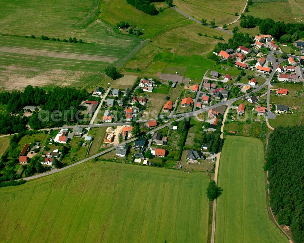 Würschnitz from the bird's eye view: Agricultural land and field boundaries surround the settlement area of the village in Würschnitz in the state Saxony, Germany