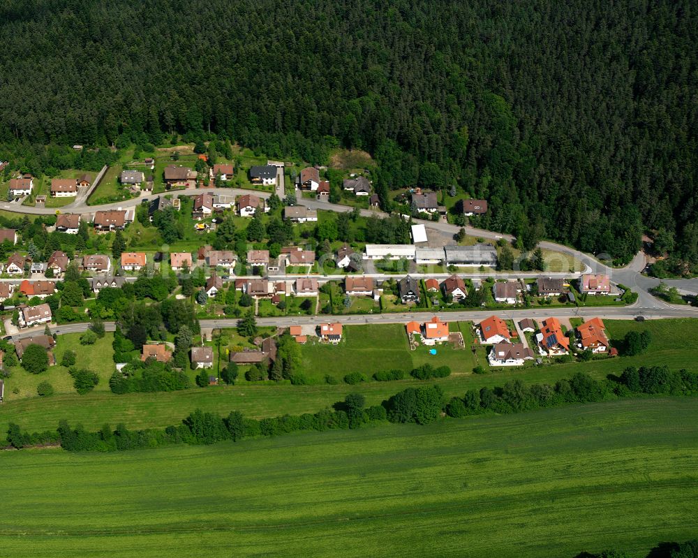 Würzbach from above - Agricultural land and field boundaries surround the settlement area of the village in Würzbach in the state Baden-Wuerttemberg, Germany