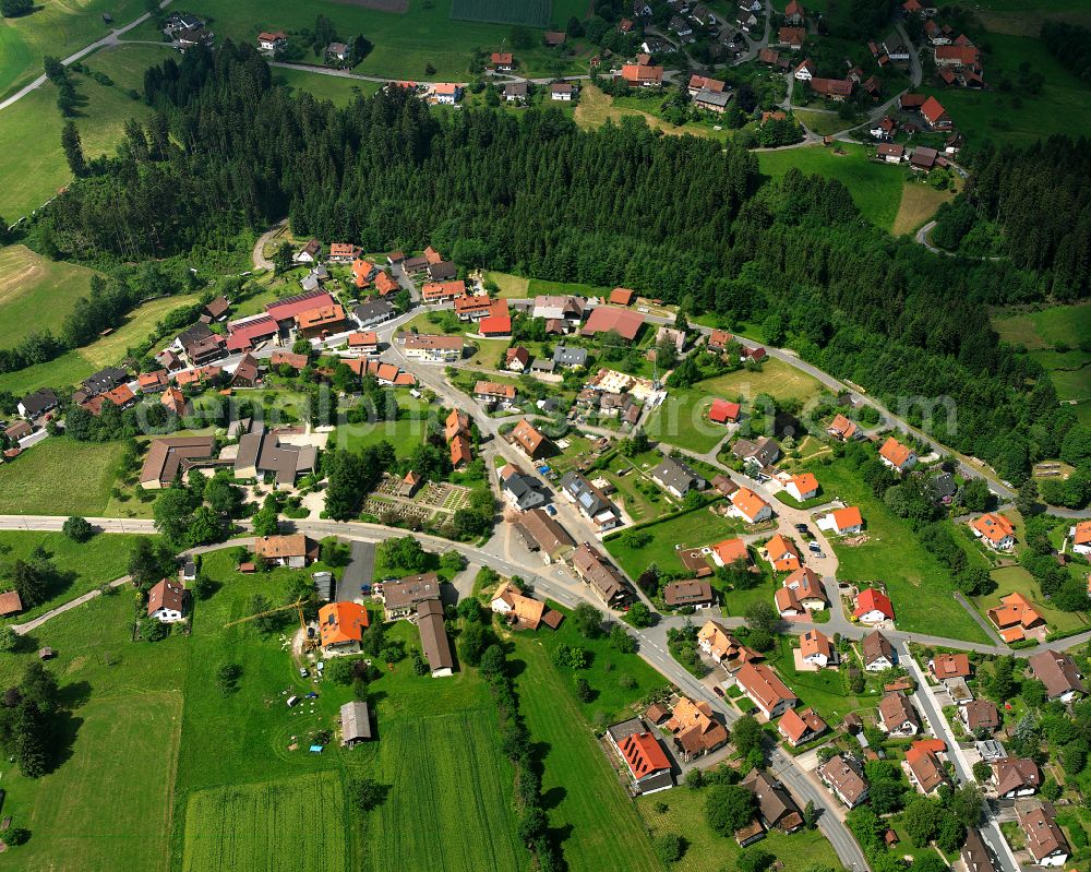 Aerial photograph Würzbach - Agricultural land and field boundaries surround the settlement area of the village in Würzbach in the state Baden-Wuerttemberg, Germany