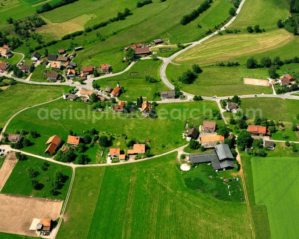 Würzbach from above - Agricultural land and field boundaries surround the settlement area of the village in Würzbach in the state Baden-Wuerttemberg, Germany