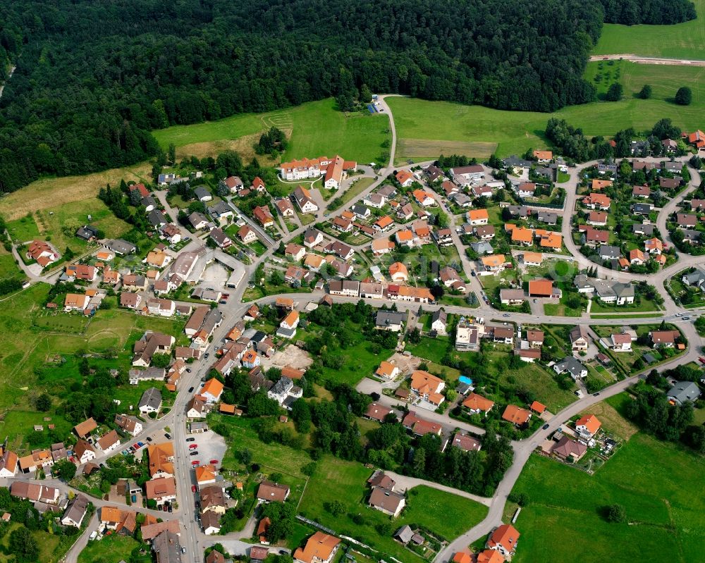 Aerial image Wüstenrot - Agricultural land and field boundaries surround the settlement area of the village in Wüstenrot in the state Baden-Wuerttemberg, Germany