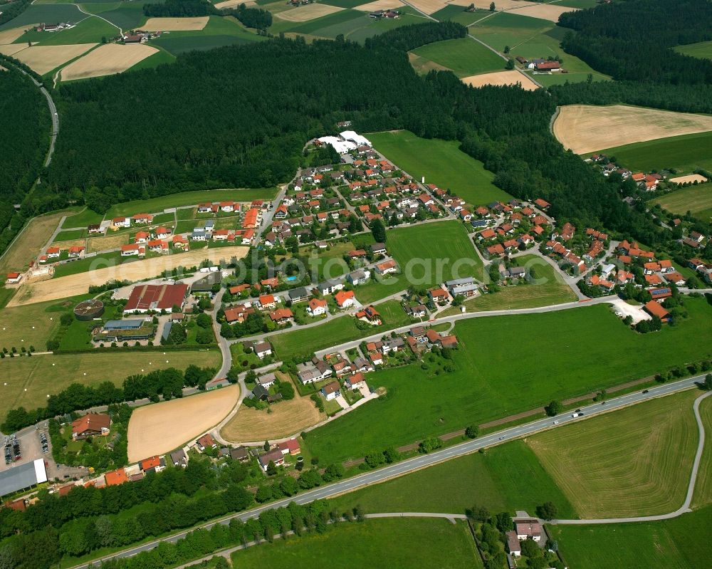 Zellhub from above - Agricultural land and field boundaries surround the settlement area of the village in Zellhub in the state Bavaria, Germany