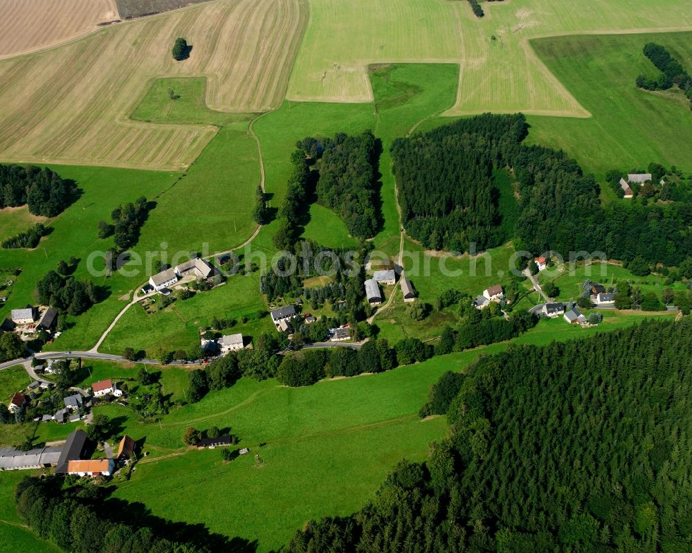 Zethau from the bird's eye view: Agricultural land and field boundaries surround the settlement area of the village in Zethau in the state Saxony, Germany