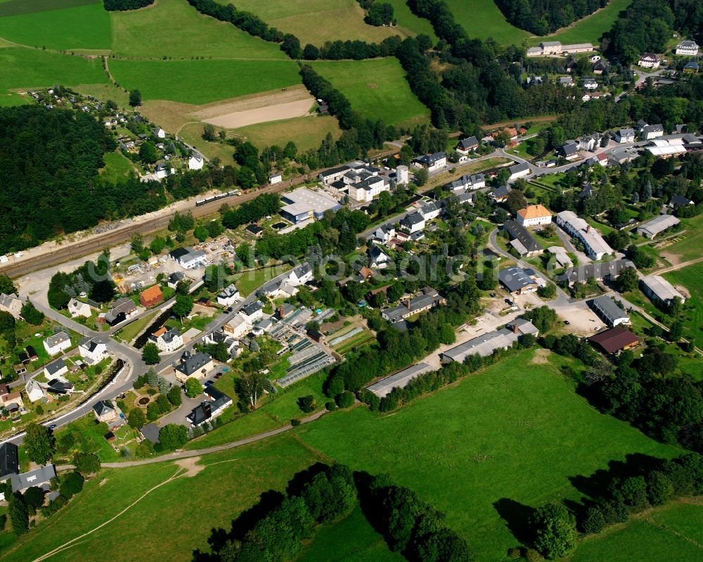 Zethau from the bird's eye view: Agricultural land and field boundaries surround the settlement area of the village in Zethau in the state Saxony, Germany