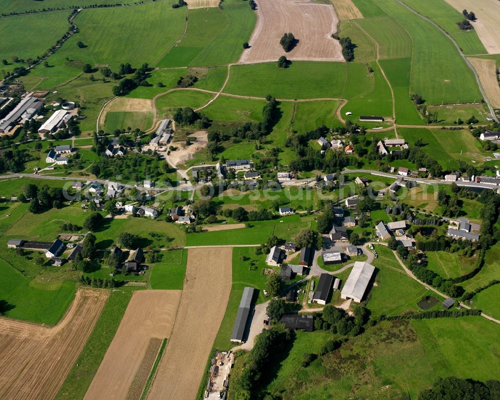 Zethau from the bird's eye view: Agricultural land and field boundaries surround the settlement area of the village in Zethau in the state Saxony, Germany