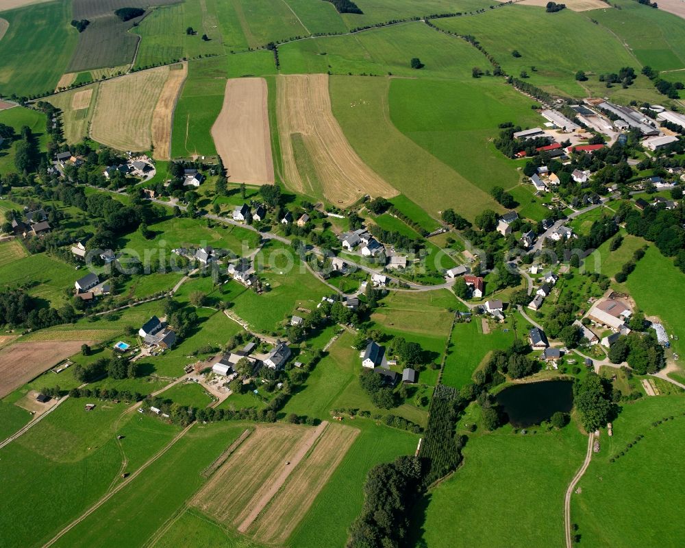 Aerial image Zethau - Agricultural land and field boundaries surround the settlement area of the village in Zethau in the state Saxony, Germany