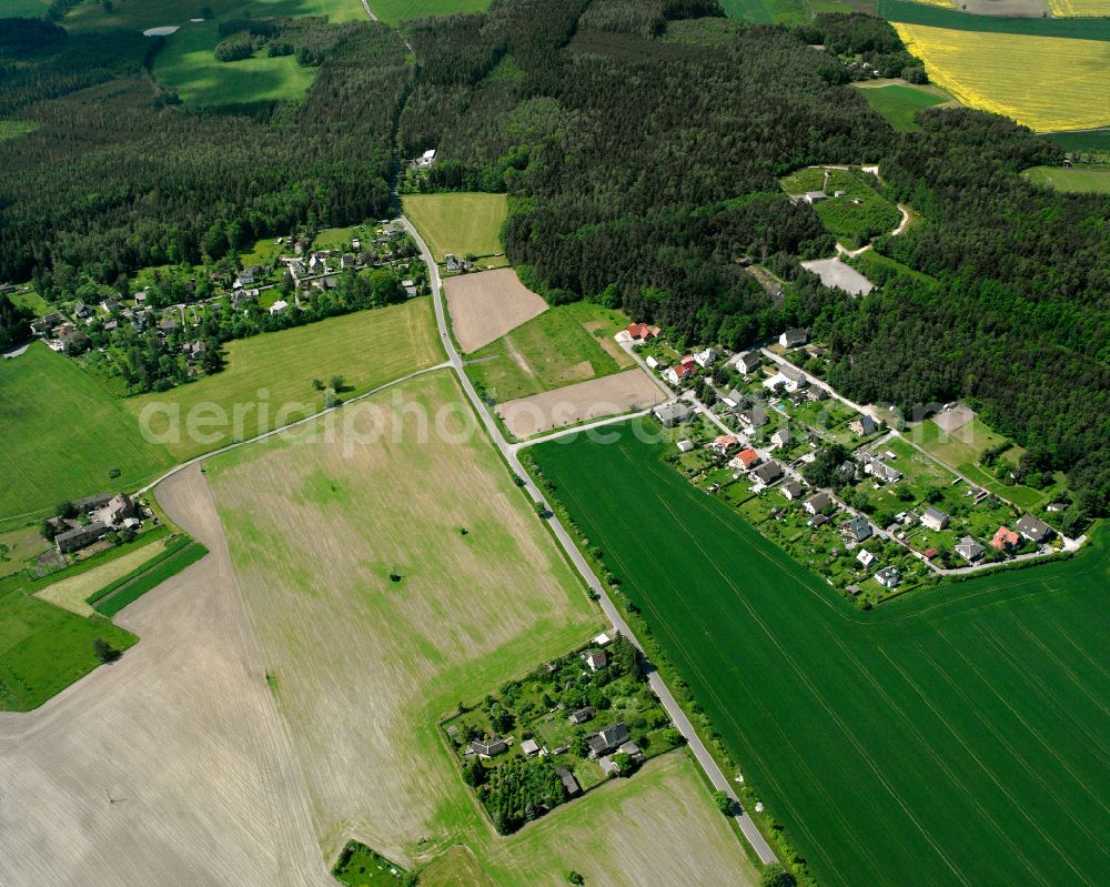 Zeulenroda from above - Agricultural land and field boundaries surround the settlement area of the village in Zeulenroda in the state Thuringia, Germany