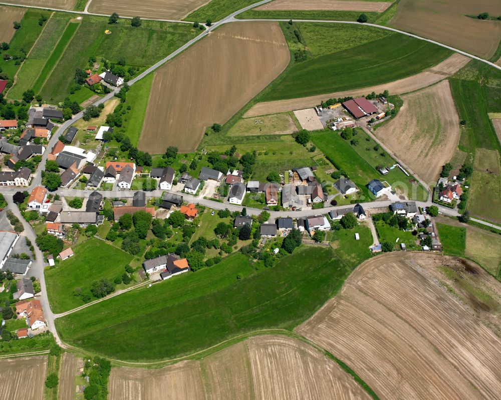 Zierolshofen from above - Agricultural land and field boundaries surround the settlement area of the village in Zierolshofen in the state Baden-Wuerttemberg, Germany