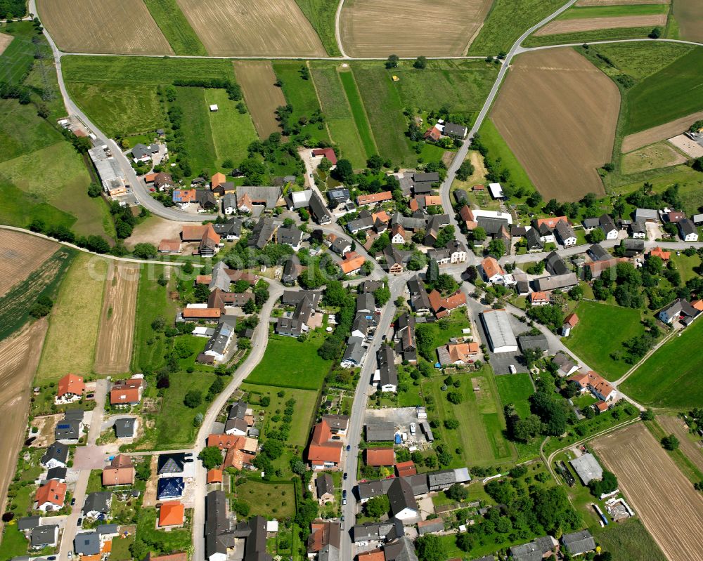 Zierolshofen from above - Agricultural land and field boundaries surround the settlement area of the village in Zierolshofen in the state Baden-Wuerttemberg, Germany