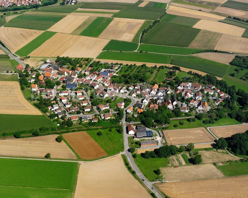 Zimmerhof from above - Agricultural land and field boundaries surround the settlement area of the village in Zimmerhof in the state Baden-Wuerttemberg, Germany