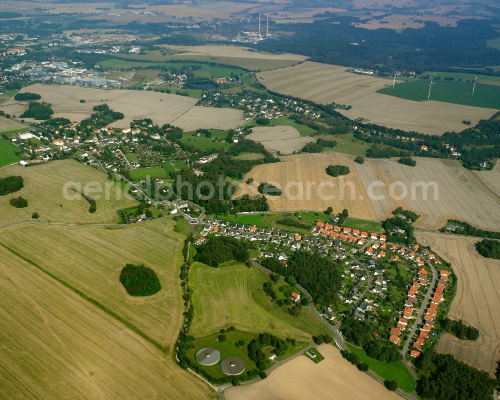 Zug from above - Agricultural land and field boundaries surround the settlement area of the village in Zug in the state Saxony, Germany