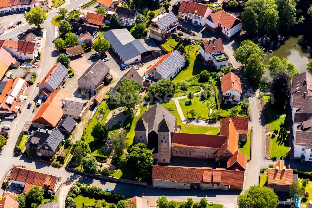 Aerial photograph Flechtdorf - Agricultural land and field borders surround the settlement area of the village in Flechtdorf in the state Hesse, Germany