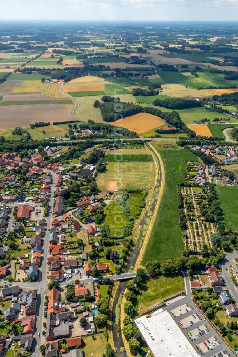 Sassenberg from the bird's eye view: Village on the river bank areas of Hessel in Sassenberg in the state North Rhine-Westphalia, Germany