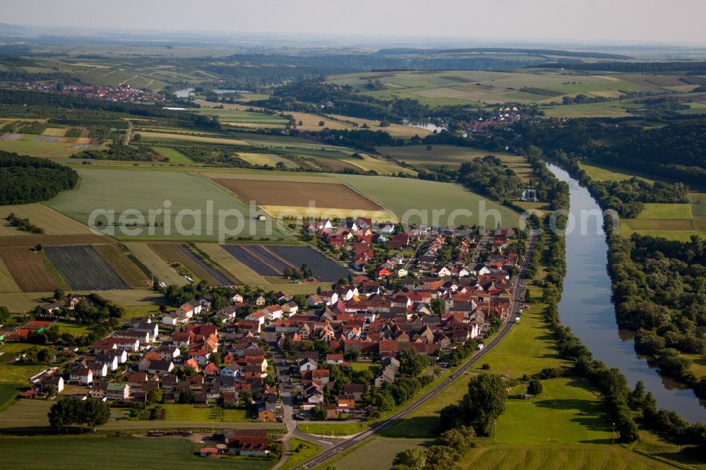 Röthlein from above - Village on the river bank areas of the Main river in the district Hirschfeld in Roethlein in the state Bavaria, Germany