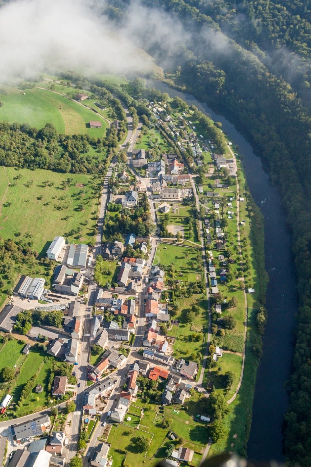 Bur from above - Village on the river bank areas of the Sauer river in the district Born in Bur in Distrikt Greiwemaacher, Luxembourg