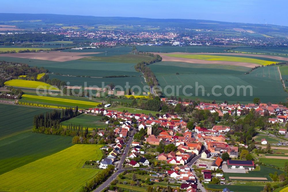 Grabe from the bird's eye view: Agricultural land and field borders surround the settlement area of the village in Grabe in the state Thuringia, Germany