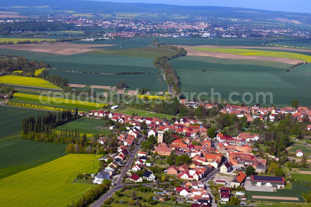 Aerial image Grabe - Agricultural land and field borders surround the settlement area of the village in Grabe in the state Thuringia, Germany