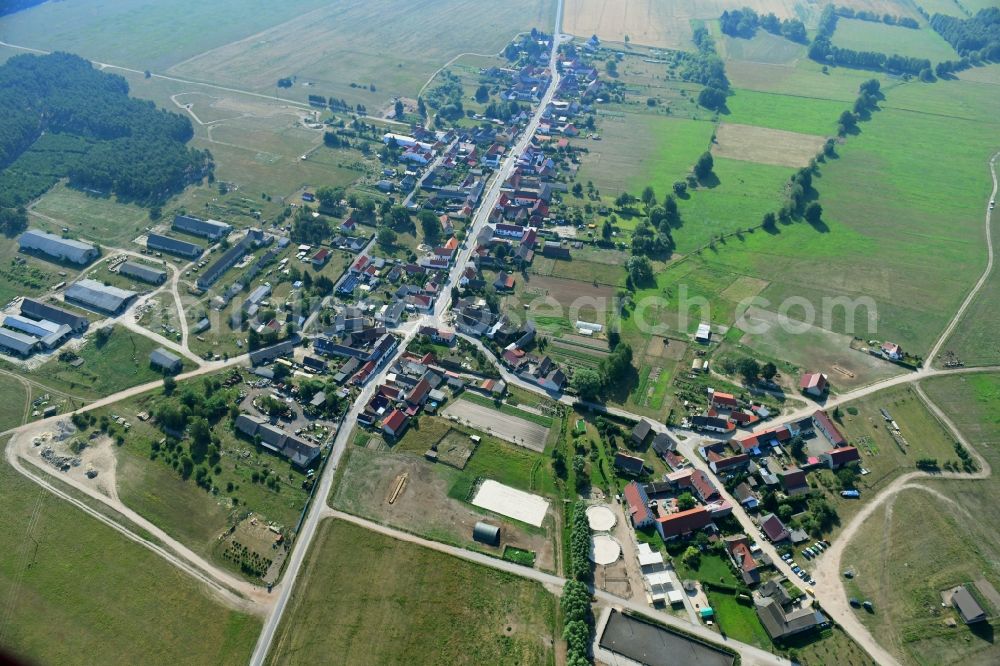 Groß Briesen from above - Agricultural land and field borders surround the settlement area of the village in Gross Briesen in the state Brandenburg, Germany