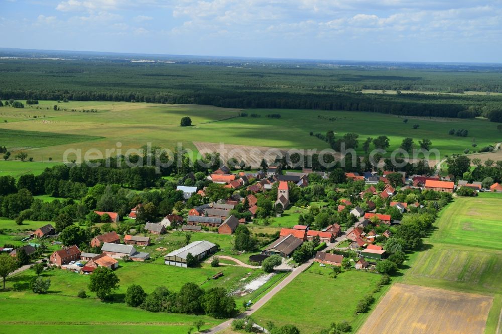 Aerial photograph Groß Leppin - Agricultural land and field borders surround the settlement area of the village in Gross Leppin in the state Brandenburg, Germany