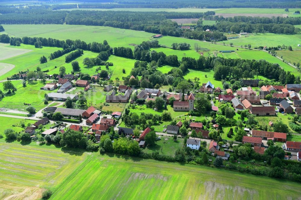 Groß Leppin from above - Agricultural land and field borders surround the settlement area of the village in Gross Leppin in the state Brandenburg, Germany