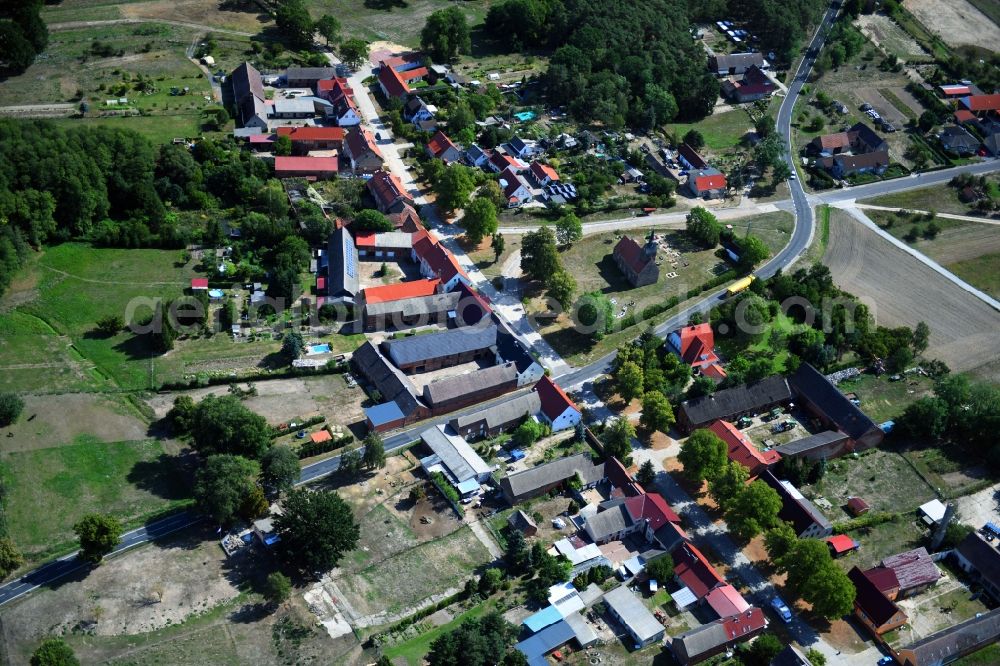 Hohenwerbig from the bird's eye view: Agricultural land and field borders surround the settlement area of the village in Hohenwerbig in the state Brandenburg, Germany