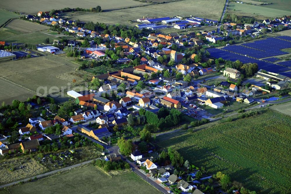 Aerial photograph Körbelitz - Agricultural land and field borders surround the settlement area of the village in Koerbelitz in the state Saxony-Anhalt, Germany