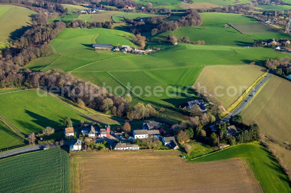 Aerial photograph Laupendahl - Agricultural land and field borders surround the settlement area of the village in Laupendahl in the state North Rhine-Westphalia, Germany