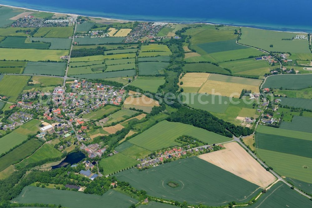 Hohenfelde from the bird's eye view: Village on marine coastal area of Baltic Sea in Hohenfelde in the state Schleswig-Holstein