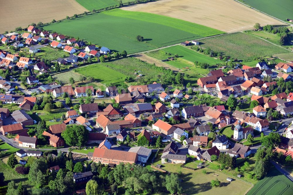 Kalefeld Sebexen from the bird's eye view: Village view from the district Sebexen the municipality Kalefeld in the state Lower Saxony. The picture shows the St. Martin church at Gan dersheimer street corner High street