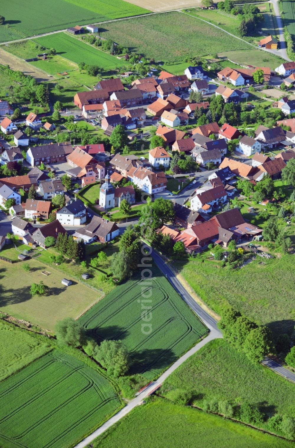 Aerial image Kalefeld Sebexen - Village view from the district Sebexen the municipality Kalefeld in the state Lower Saxony. The picture shows the St. Martin church at Gan dersheimer street corner High street